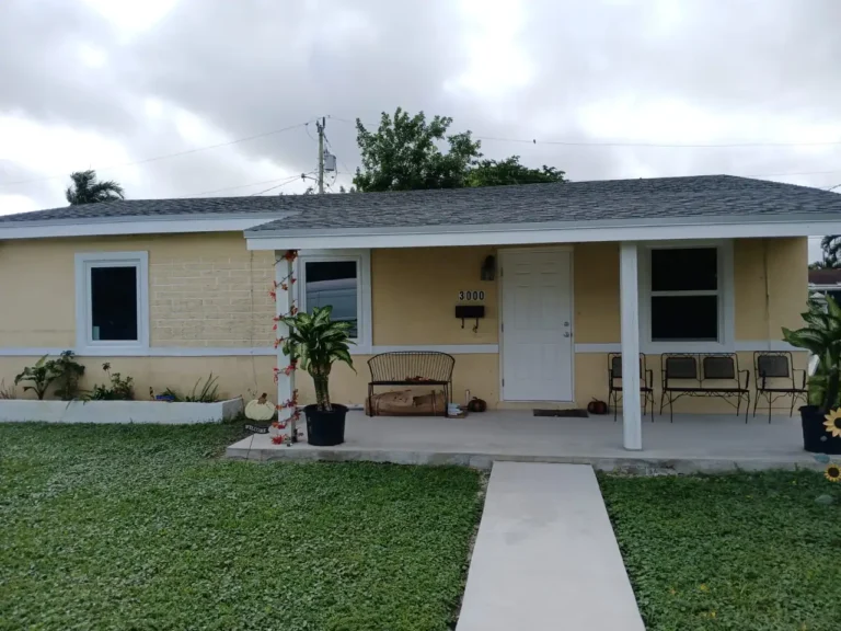Focusing on the professional sealing and insulation applied around the new impact windows in Miami Gardens.
